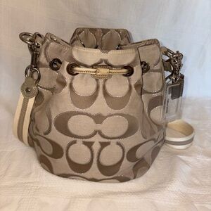 Coach Poppy Beige and Tan Signature Drawstring Bucket bag
